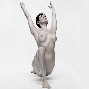 Monika Werner - founder of Bold & Naked - practicing Naked Yoga, Crescent Lunge